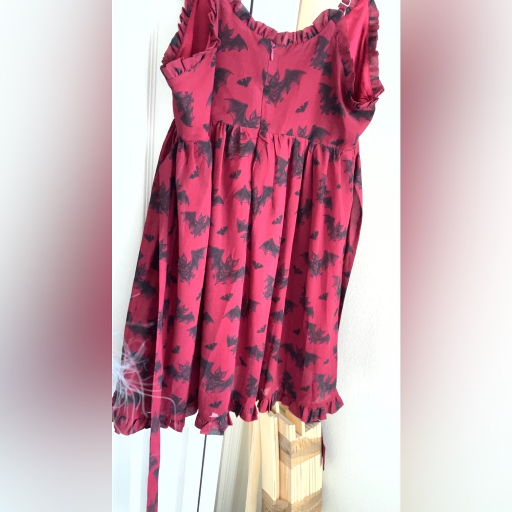Sourpuss bat attack! Chiffon tie back mini dress
